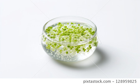 Sparkling functional beverage with green caviar pearls for modern wellness drink concept 128959825