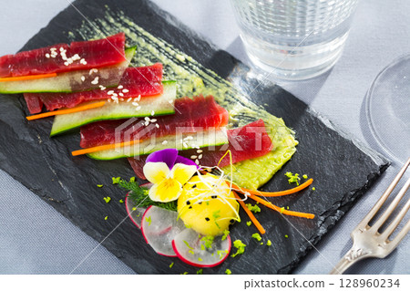 Raw tuna sashimi with cucumber and avocado sauce Raw tuna sashimi with cucumber and avocado sauce 128960234