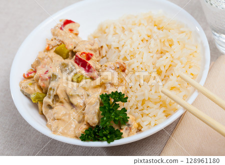 Chicken fillet red curry with jasmine rice Chicken fillet red curry with jasmine rice 128961180