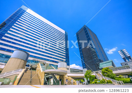 Tokyo cityscape in Japan, overlooking Shinagawa Station and office buildings, July 26th Tokyo cityscape in Japan, overlooking Shinagawa Station and office buildings, July 26th 128961223