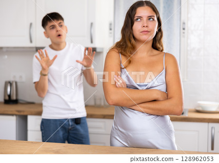 Young husband is dissatisfied with the act of his wife 128962053