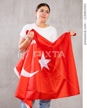 Sad girl upset by defeat of her favorite Turkey team 128962093