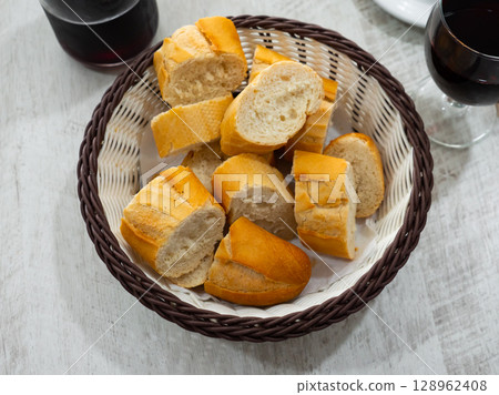 Sliced bread and glass of wine 128962408