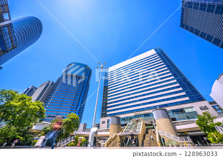 Tokyo cityscape in Japan, overlooking Shinagawa Station and office buildings, July 26th 128963033
