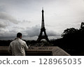 Famous landmark in Paris, France: Eiffel Tower (view from Palais Chaillot) 128965035