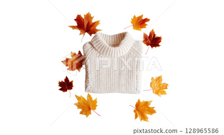 White sweater rests among colorful autumn leaves, created with AI, PNG 128965586
