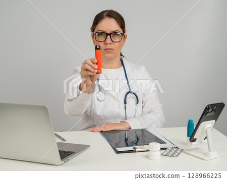 Doctor warns about dangers of smoking disposable vapes. Doctor warns about dangers of smoking disposable vapes. 128966225