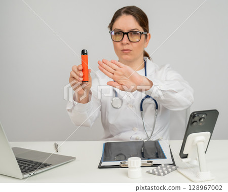Doctor warns about dangers of smoking disposable vapes. Doctor warns about dangers of smoking disposable vapes. 128967002