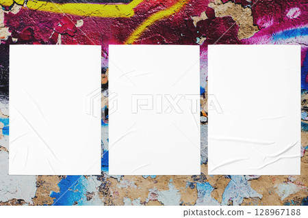 colorful urban wall texture with three wrinkled glued poster templates 128967188