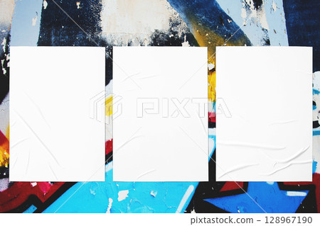 colorful urban wall texture with three wrinkled glued poster templates 128967190