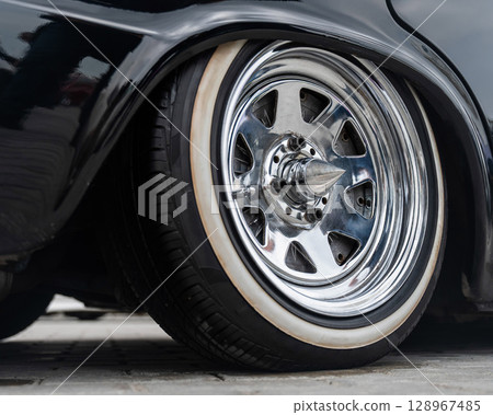 Close-Up of Custom Car Wheel and Tire Excellence. Close-Up of Custom Car Wheel and Tire Excellence. 128967485