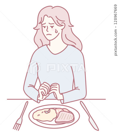A woman is deeply reflecting on her meal while feeling an overwhelming sense of concern 128967669