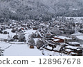 Snow falling Shirakawa Town 128967678