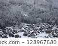 Snow falling Shirakawa Town 128967680