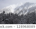 A snow-capped mountain 128968089