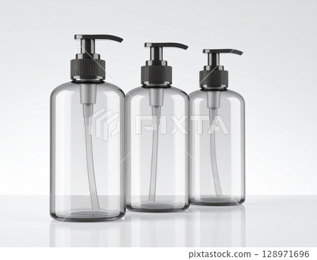 Three Clear Plastic Pump Bottles on White Surface for Beauty Product Mockups 128971696
