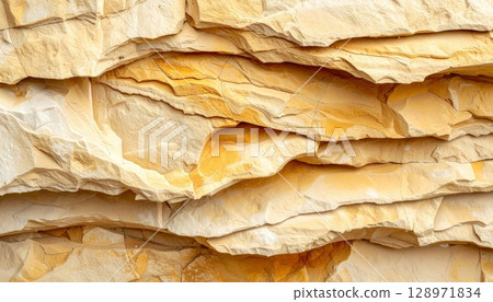 Layered Stone Wall Texture in Beige and Brown for Backdrops and Design Projects 128971834