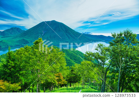 Nikko City, Tochigi Prefecture: Mount Nantai and Lake Chuzenji in Oku-Nikko as summer approaches Nikko City, Tochigi Prefecture: Mount Nantai and Lake Chuzenji in Oku-Nikko as summer approaches 128973533