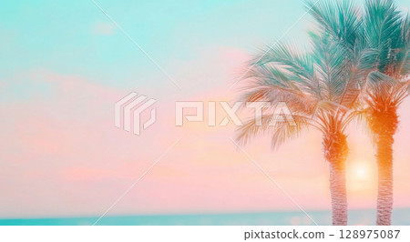 Two palm trees on serene sunset beach with pastel sky, nature background 128975087