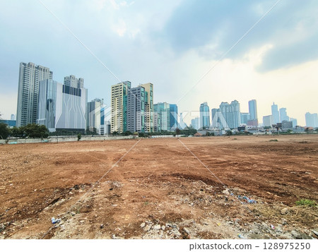 building on construction site in progress 128975250