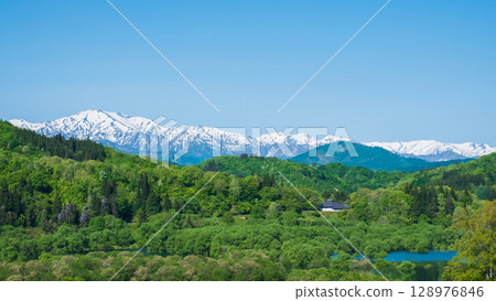 Lake Shirakawa and the Iide mountain range (May) 128976846
