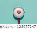 Red Heart on Stethoscope, Healthcare and Heart Health Concept 128977247