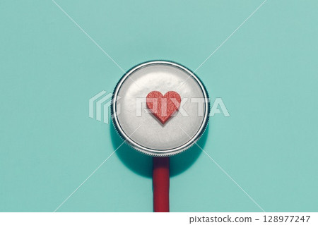 Red Heart on Stethoscope, Healthcare and Heart Health Concept Red Heart on Stethoscope, Healthcare and Heart Health Concept 128977247