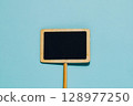 Blank Mini Chalkboard Sign on Blue, Message and Promotion 128977250
