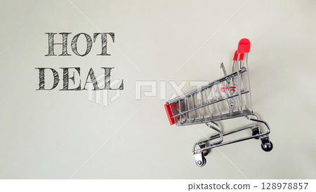 Shopping cart with the word HOT DEAL written on it Shopping cart with the word HOT DEAL written on it 128978857