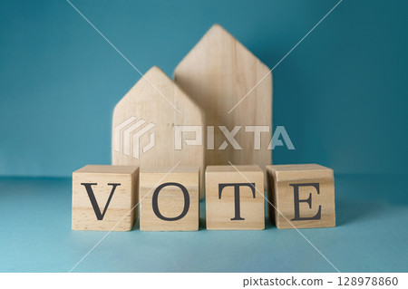 Wooden block with the word Vote written on it 128978860