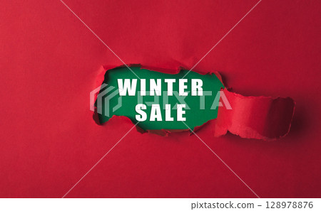 Red background with a green word that says Winter Sale Red background with a green word that says Winter Sale 128978876