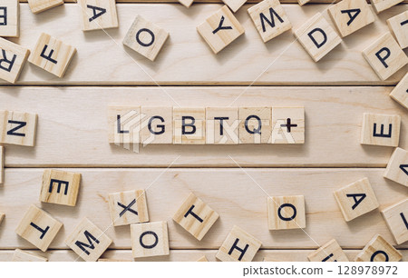 A jumble of wooden letters spell out the word Lgbtq A jumble of wooden letters spell out the word Lgbtq 128978972