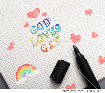 A piece of paper with rainbow and hearts 128978975