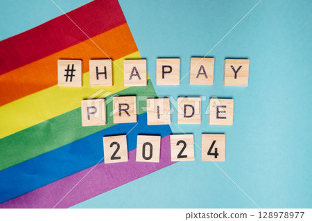 A rainbow flag with the hashtag HappyPride2024 A rainbow flag with the hashtag HappyPride2024 128978977