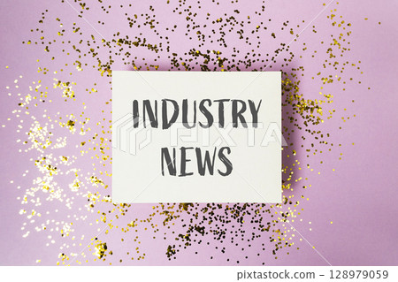 White sign with the word Industry News written on it 128979059