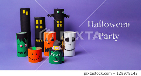 Bunch of paper tubes with Halloween party written on them 128979142