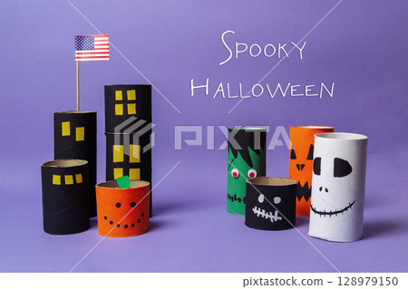 Poster of a city with a flag and the words spooky Halloween written below 128979150