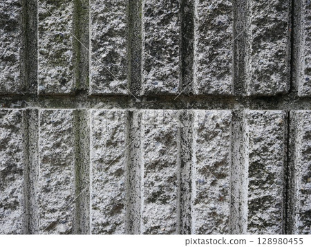 The charm of concrete blocks. Perfect as copy space. A background that makes the subject stand out. The charm of concrete blocks. Perfect as copy space. A background that makes the subject stand out. 128980455