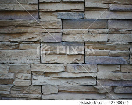 The charm of concrete blocks. Perfect as copy space. A background that makes the subject stand out. The charm of concrete blocks. Perfect as copy space. A background that makes the subject stand out. 128980535