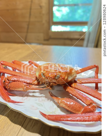 We ate red snow crab in a log cabin. We ate red snow crab in a log cabin. 128980624
