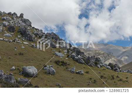 Castle Hill, Canterbury, New Zealand / Huge rocks and scattered rocks at Kura Tawhiti Castle Hill, Canterbury, New Zealand / Huge rocks and scattered rocks at Kura Tawhiti 128981725