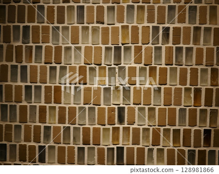 Old tile wall, tile art, perfect for copy space. Can create a modern atmosphere. 128981866