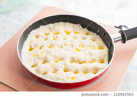 Focaccia baked in a frying pan Focaccia baked in a frying pan 128983565