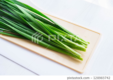 Freshly washed chives Freshly washed chives 128983742