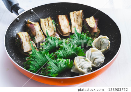 Handmade eggplant and shiso dumplings 128983752