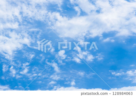 June sky: White clouds in the morning blue sky 29 June sky: White clouds in the morning blue sky 29 128984063