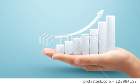 Hand holding financial graph with increasing chart trend symbolizing business growth success concept marketing strategy economic development 128984152