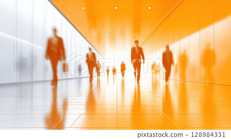 Office workers walking modern corporate building hallway during morning rush create busy urban workplace environment with light reflection Office workers walking modern corporate building hallway during morning rush create busy urban workplace environment with light reflection 128984331