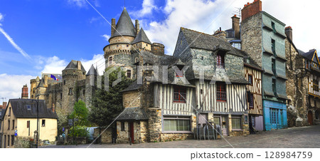 France , Brittany travel and landmarks. medieval Vitre town with castle and its charming old streets and  half-timbered houses 128984759