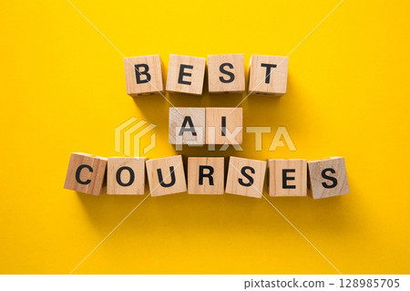 Best artificial intelligence ai courses written on wooden blocks on yellow background Best artificial intelligence ai courses written on wooden blocks on yellow background 128985705
